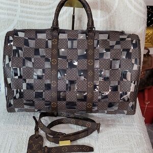 Louis Vuitton Limited Edition Keepall 50 Bandoliere Monogram and Clear Vinyl Bag